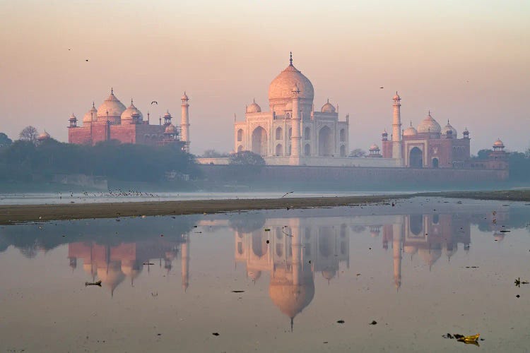 Taj Mahal At Dawn Reflected In The River, India