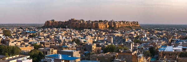 Rajasthan: Panoramic Of Jaisalmer Old Town At Sunset, India by Matteo Colombo