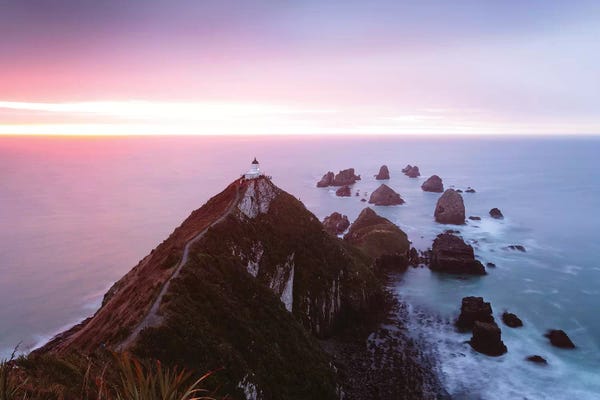 Rainbows: Nugget Point Lighthouse, New Zealand by Matteo Colombo