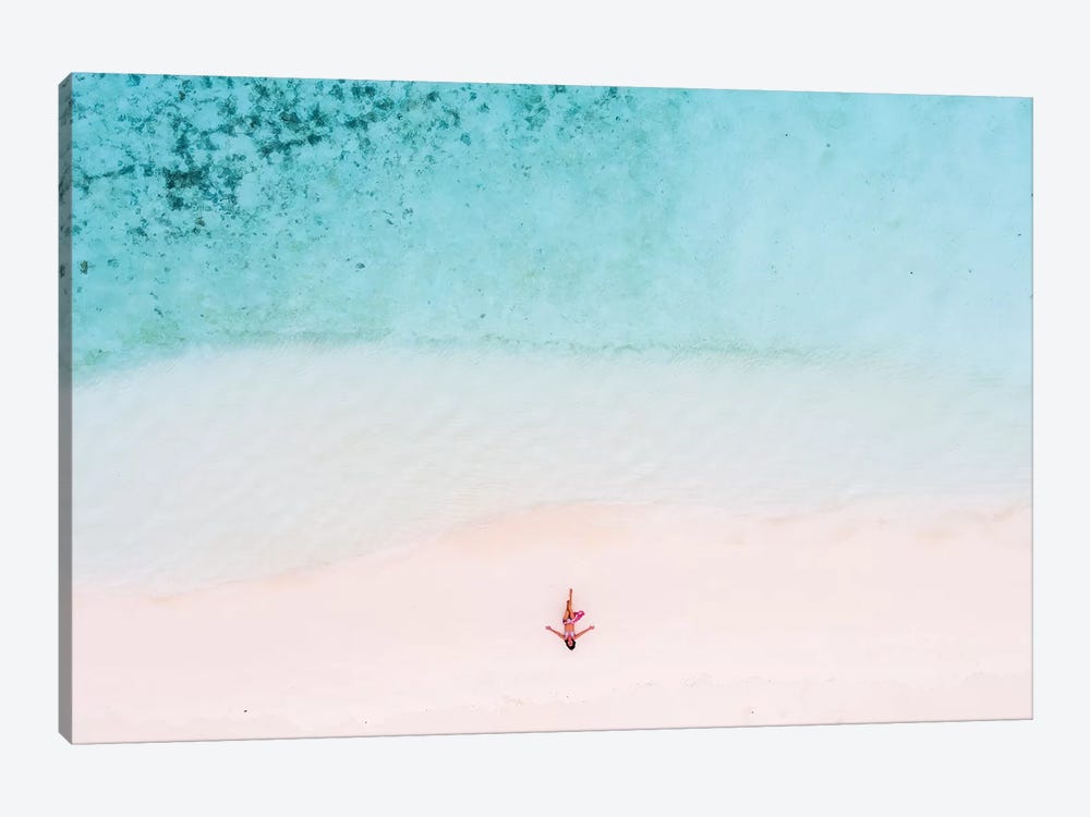 Woman Relaxing On Beach, Maldives by Matteo Colombo 1-piece Canvas Print