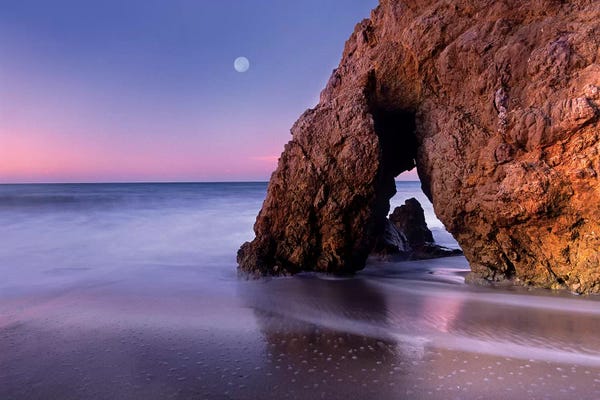 Malibu: Sea Arch And Full Moon Over El Matador State Beach, Malibu, California by Tim Fitzharris