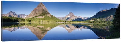 Mountains reflected in lake. Glacier National Park. Montana. Usa. Canvas Art Print - Montana Art