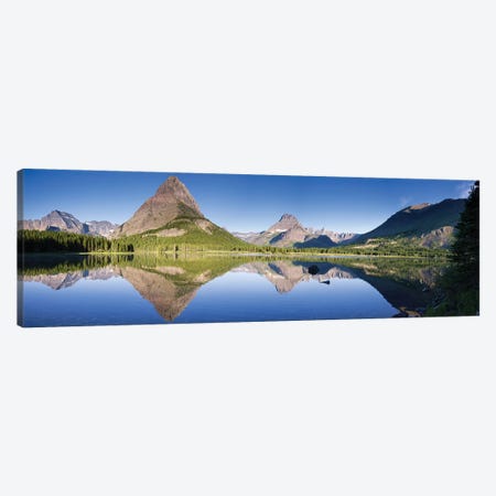 Mountains reflected in lake. Glacier National Park. Montana. Usa. Canvas Print #TNO15} by Tom Norring Canvas Print