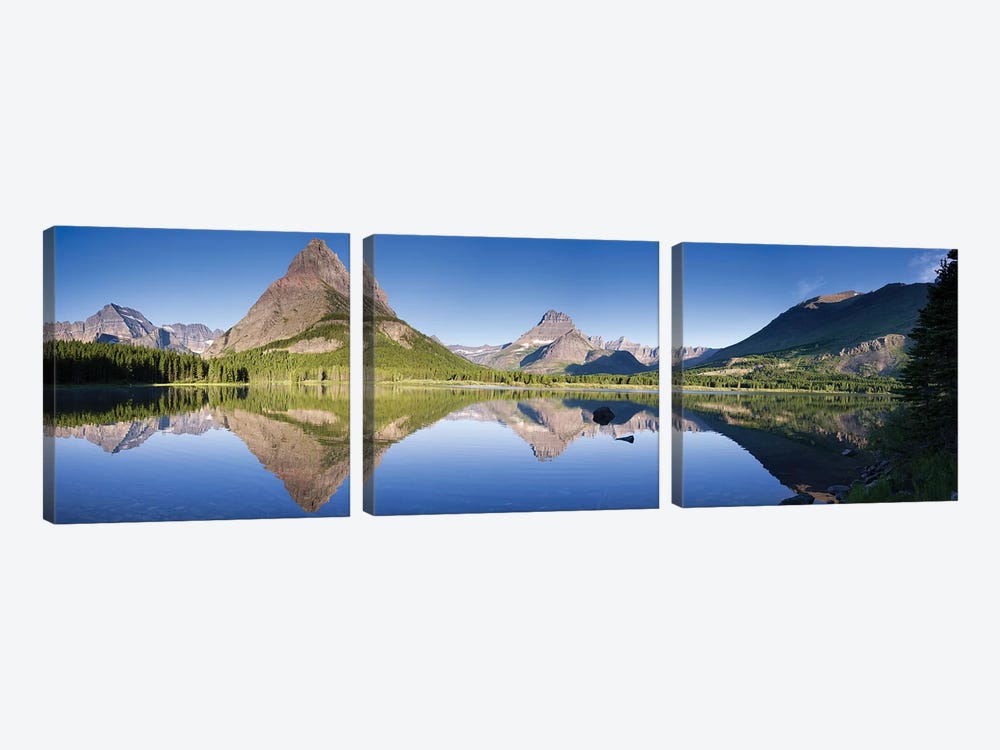 Mountains reflected in lake. Glacier National Park. Montana. Usa. by Tom Norring 3-piece Art Print