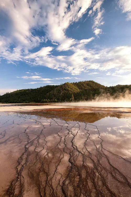 Cloud reflections over chemical Sediments. Yellowstone National Park, Wyoming.