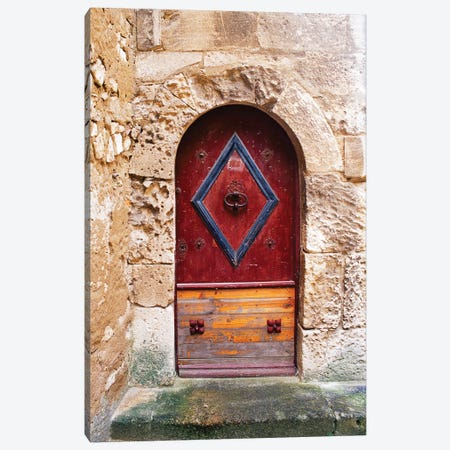 Colorful door in the stone wall of a chateau in France. Canvas Print #TOH1} by Tom Haseltine Canvas Artwork