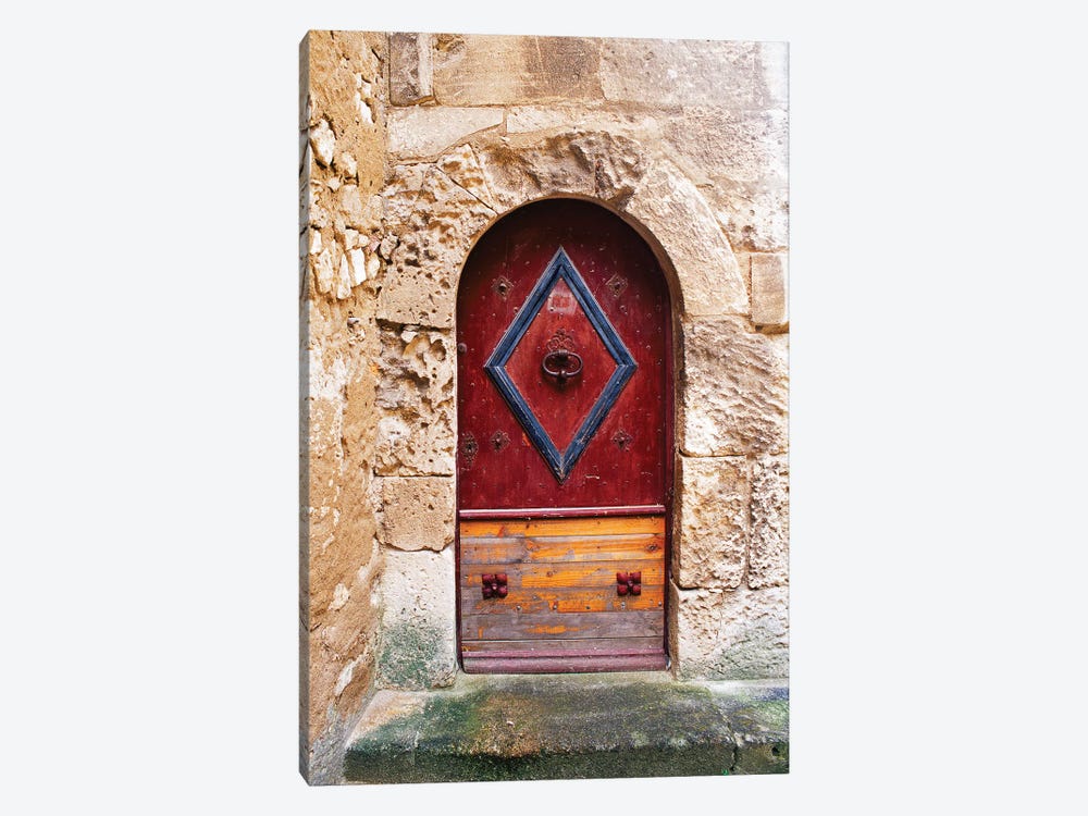 Colorful door in the stone wall of a chateau in France. 1-piece Canvas Artwork