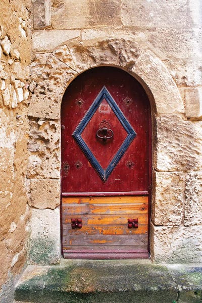 Doors: Colorful door in the stone wall of a chateau in France. by Tom Haseltine