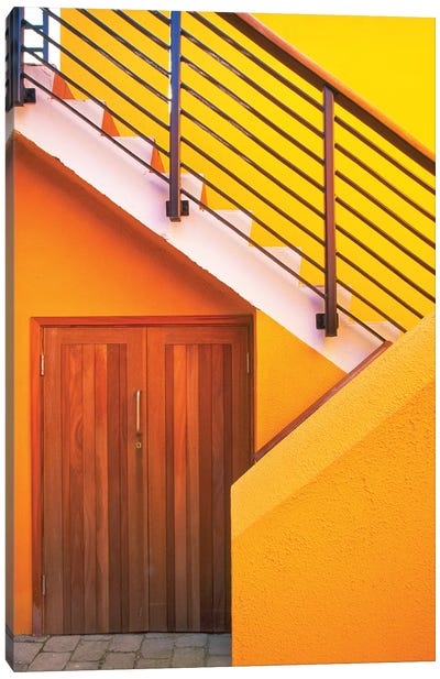Geometric view of a yellow and orange stairway. Canvas Art Print - Stairs & Staircases