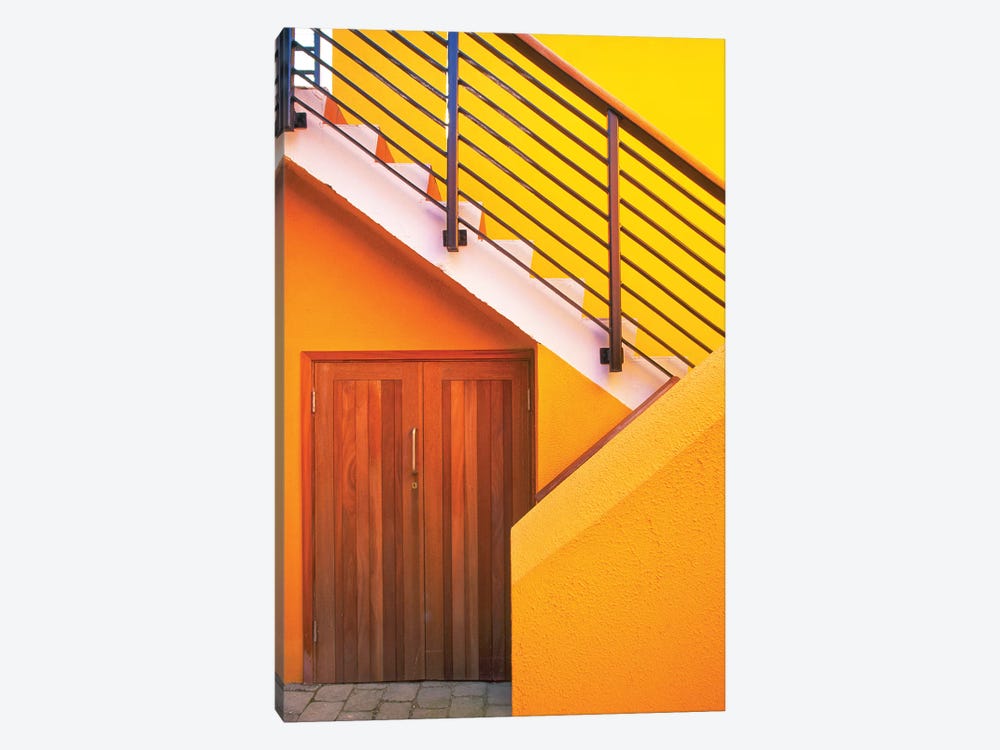 Geometric view of a yellow and orange stairway. by Tom Haseltine 1-piece Canvas Art Print