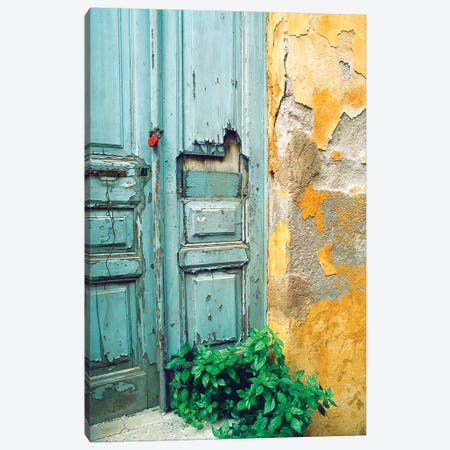 Red lock on a weathered blue door. Canvas Print #TOH4} by Tom Haseltine Art Print