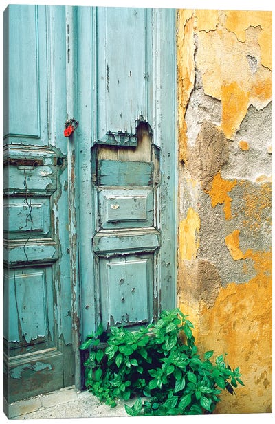 Red lock on a weathered blue door. Canvas Art Print