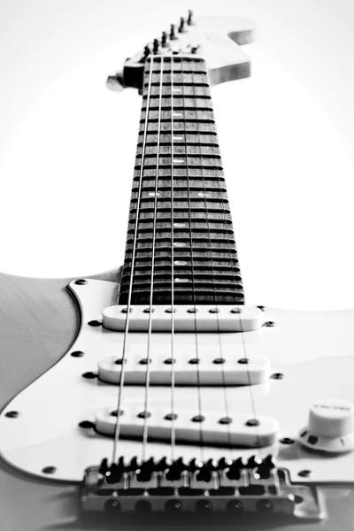 Music: Black and White Guitar Side by Tom Quartermaine