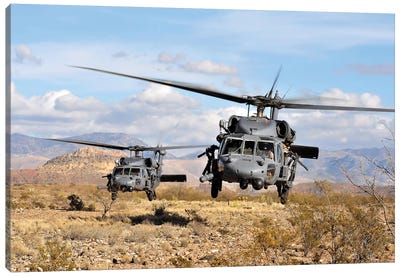 Two HH-60 Pave Hawk Helicopters Preparing To Land Canvas Art Print
