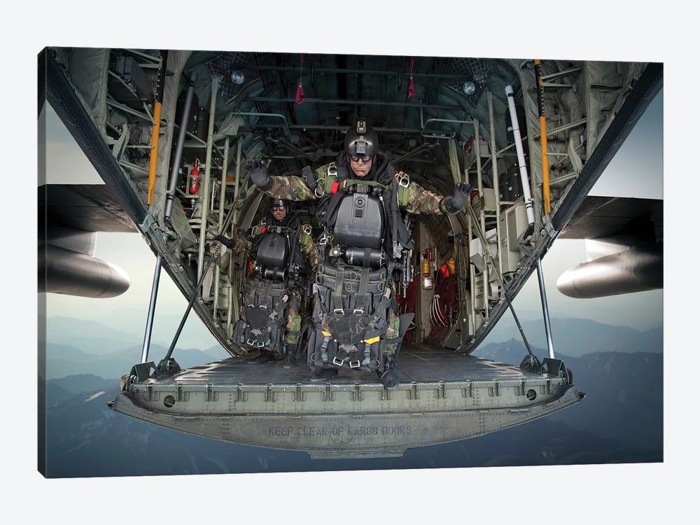 US Navy Seals Combat Diver Prepares For Halo Jump Operations From A C-130 Hercules by Tom Weber 1-piece Canvas Print