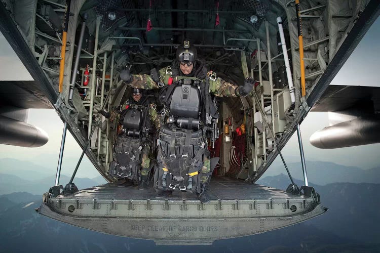 US Navy Seals Combat Diver Prepares For Halo Jump Operations From A C-130 Hercules