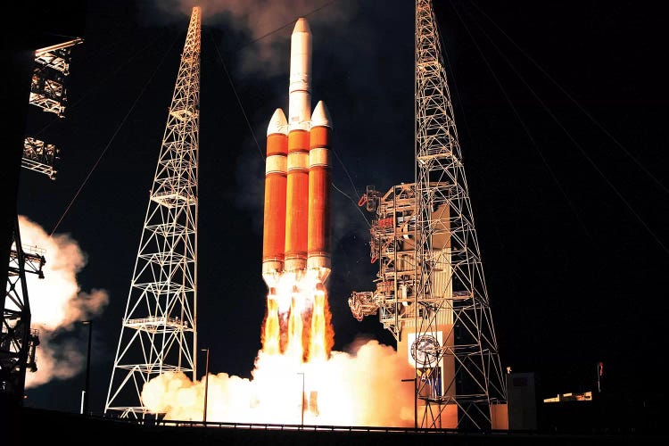 A Delta IV Heavy Rocket Lifts Off