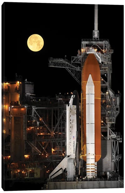 A Nearly Full Moon Sets As Space Shuttle Discovery Sits Atop The Launch Pad Canvas Art Print - Stocktrek Images