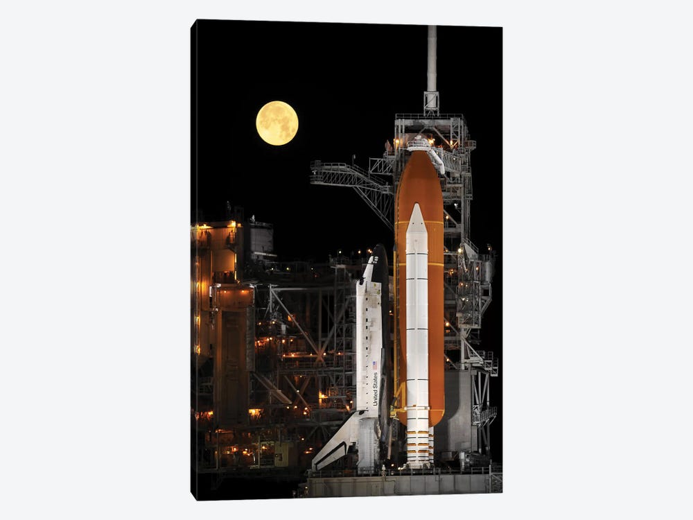 A Nearly Full Moon Sets As Space Shuttle Discovery Sits Atop The Launch Pad by Stocktrek Images 1-piece Art Print