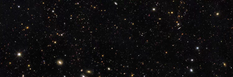 A Panoramic View Of Over 7,500 Galaxies Stretching Back Through Most Of The Universe's History by Stocktrek Images wall art