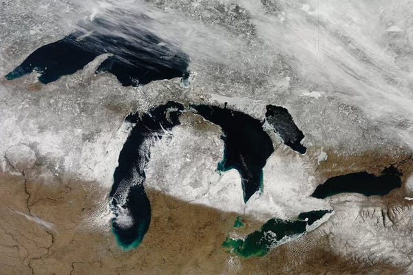 Wisconsin: Satellite View Of Snow Across Wisconsin, Michigan, And Canada by Stocktrek Images