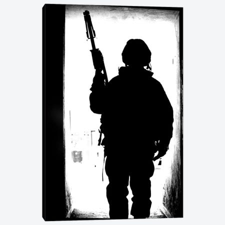 Silhouette Of A British Soldier In A Doorway At Camp Condor, Iraq Canvas Print #TRK201} by Andrew Chittock Canvas Art Print