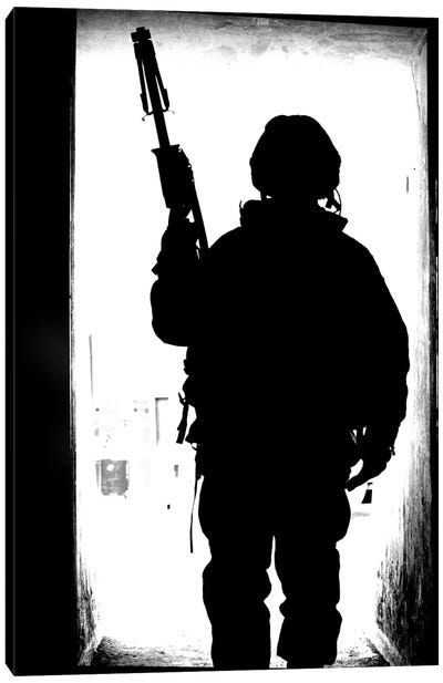 Silhouette Of A British Soldier In A Doorway At Camp Condor, Iraq Canvas Art Print