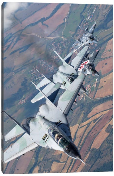 Bulgarian And Polish Air Force MiG-29s Flying Over Bulgaria I Canvas Art Print