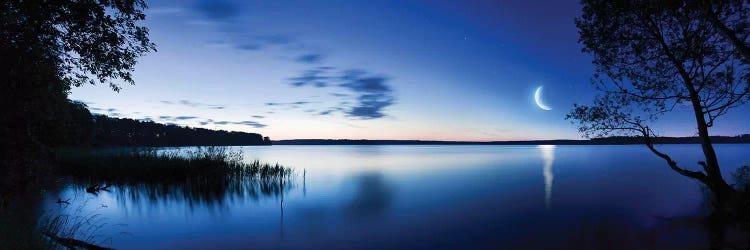 Moon Rising Over Tranquil Lake Against Moody Sky, Mozhaisk, Russia. by Evgeny Kuklev wall art