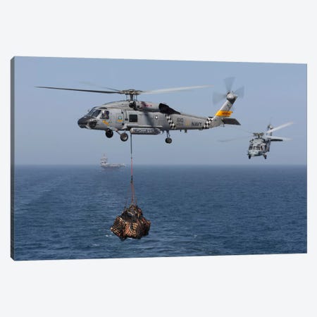 A SH-60J Seahawk Transfers Cargo During A Vertical Replenishment Canvas Print #TRK249} by Gert Kromhout Art Print