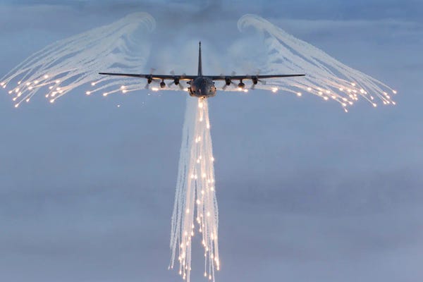 Airplanes: MC-130H Combat Talon Dropping Flares by Gert Kromhout