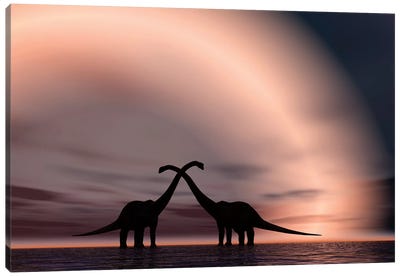 The Silhouetted Forms Of A Pair Of Courting Sauropod Dinosaurs Canvas Art Print - Stocktrek Images