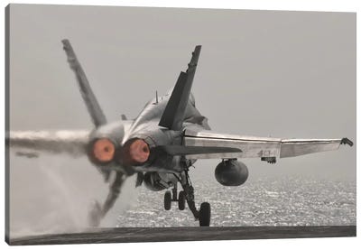 An F/A-18C Hornet Takes Off From USS George H.W. Bush Canvas Art Print