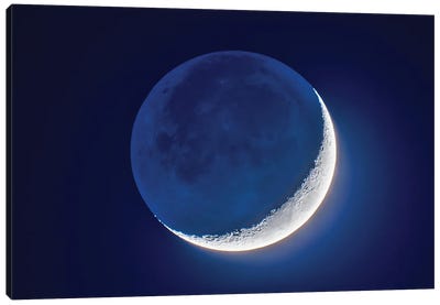 4-Day Old Waxing Crescent Moon With Earthshine. Canvas Art Print