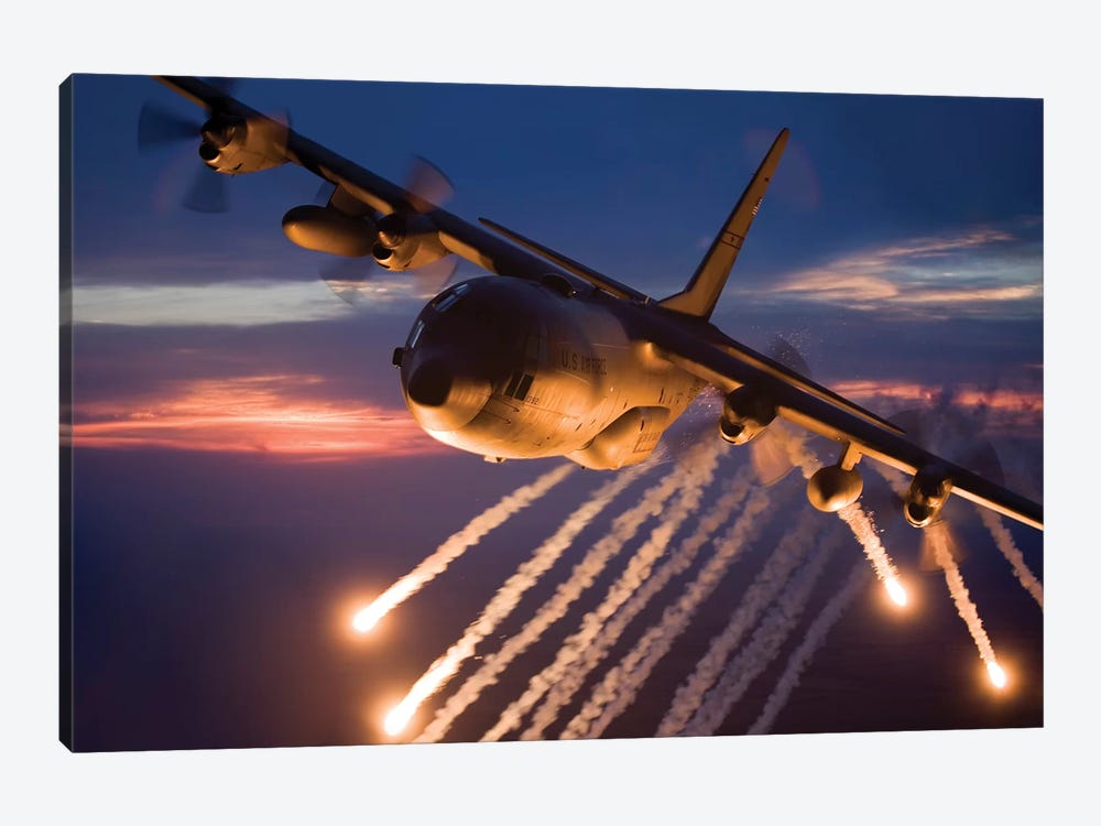 C-130 Hercules Releases Flares During A Mission Over Kansas by HIGH-G Productions 1-piece Canvas Art Print