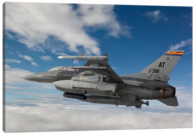 F-16 Fighting Falcon Flies With An AGM-65 Maverick Missile Canvas Art Print - Veterans Day