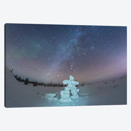 Milky Way And Winter Stars Over A Mock-Up Inukshuk Figure Made Of Snow, Canada. Canvas Print #TRK3035} by Alan Dyer Art Print
