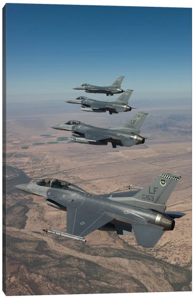 Four F-16s Maneuver On A Training Mission Over The Arizona Desert Canvas Art Print