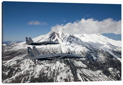 Two F-15 Eagles Fly Past Snow Capped Peaks In Central Oregon Canvas Art Print