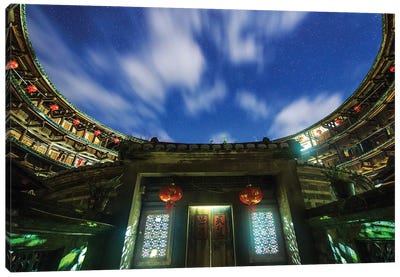A Cloudy Night At Fujian Tulou, A World Heritage Site In The Fujian Province Of China Canvas Art Print - Jeff Dai