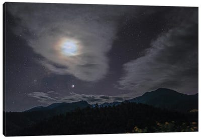 The Lunar Corona Appear Among The Passing Clouds Above The Mountain In Pai, North Of Thailand Canvas Art Print - Jeff Dai