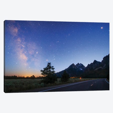 The Milky Way Appears In The Evening Twilight Above Grand Teton National Park, Wyoming, USA Canvas Print #TRK3354} by Jeff Dai Canvas Wall Art