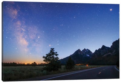 The Milky Way Appears In The Evening Twilight Above Grand Teton National Park, Wyoming, USA Canvas Art Print - Jeff Dai