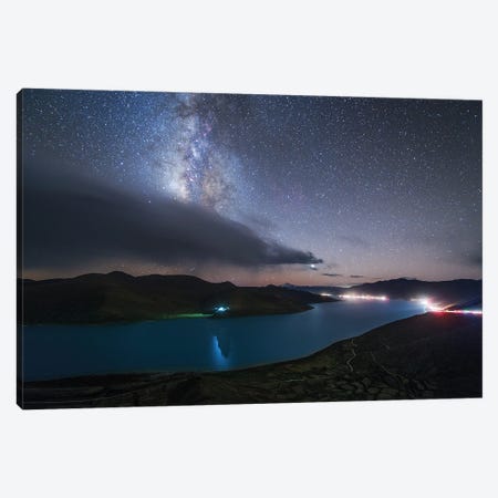 The Milky Way Shines Among The Passing Clouds Above Yamdrok Lake, Tibet, China Canvas Print #TRK3358} by Jeff Dai Canvas Art Print