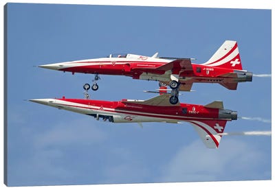 F-5 Tiger II Aircraft Of Patrouille Suisse Demonstrate The Calypso Pass Canvas Art Print