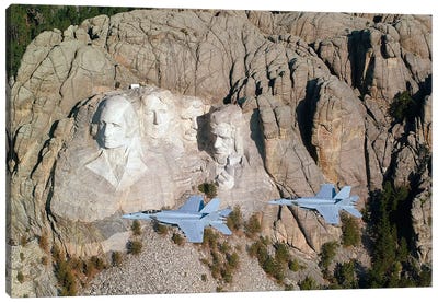 Two F/A-18E Super Hornets Conduct A Fly By Of Mount Rushmore During Training Exercise. Canvas Art Print - By Air