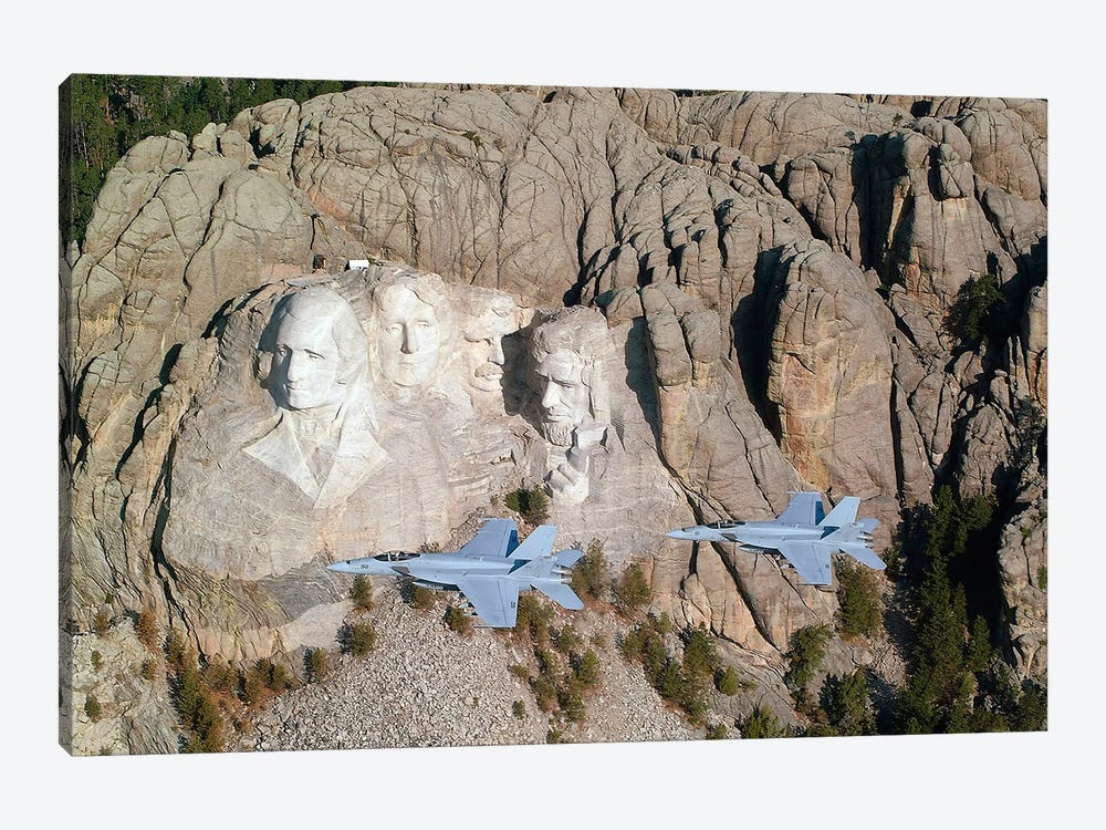Two F/A-18E Super Hornets Conduct A Fly By Of Mount Rushmore During Training Exercise. by Stocktrek Images 1-piece Art Print