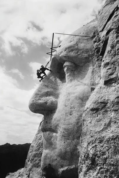 Gutzon Borglum Inspecting Work On The Face Of President Washington, Mt Rushmore, South Dakota by Vernon Lewis Gallery canvas print