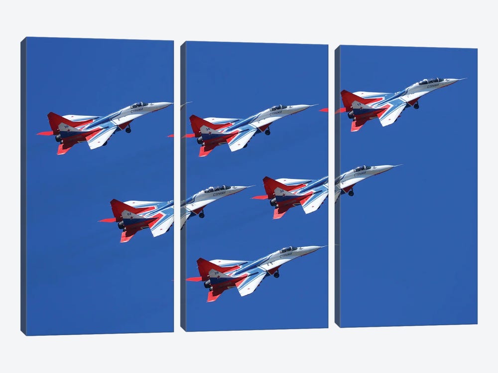 Mig-29 Jet Fighters Of Strizhi (Swifts) Aerobatics Team Of The Russian Air Force Fly In Formation by Artem Alexandrovich 3-piece Canvas Artwork