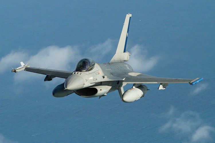 A Chilean Air Force F-16 Fighting Falcon Flying Over The Atlantic Ocean